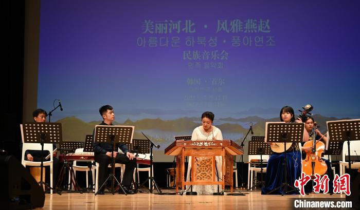 圖為音樂會現(xiàn)場?！∈谞栔袊幕行墓﹫D