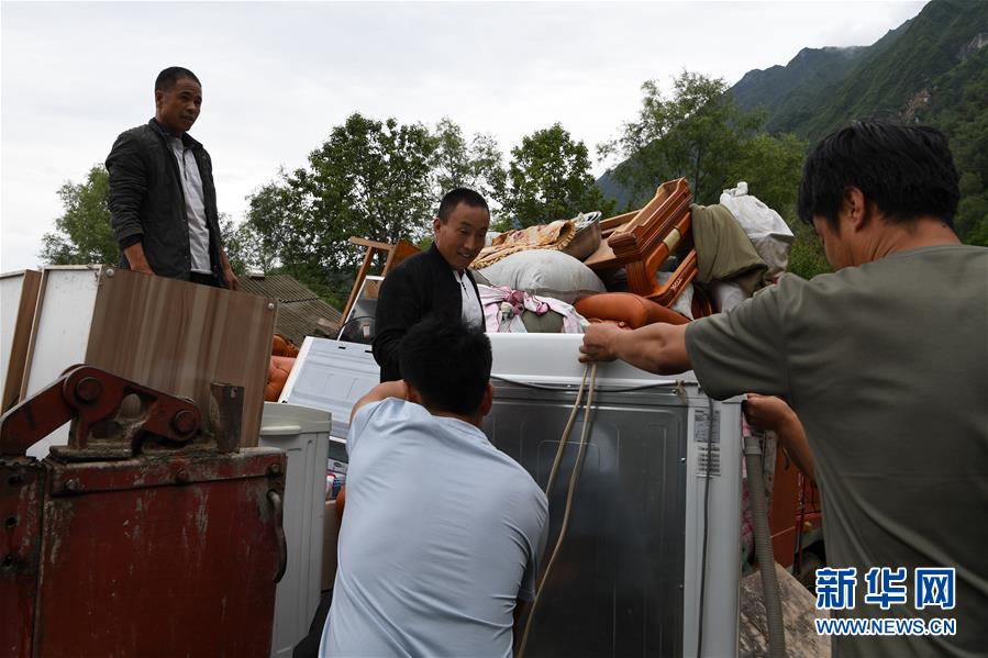 （新華全媒+）（9）千里“挪窩”，踏實(shí)開啟新生活