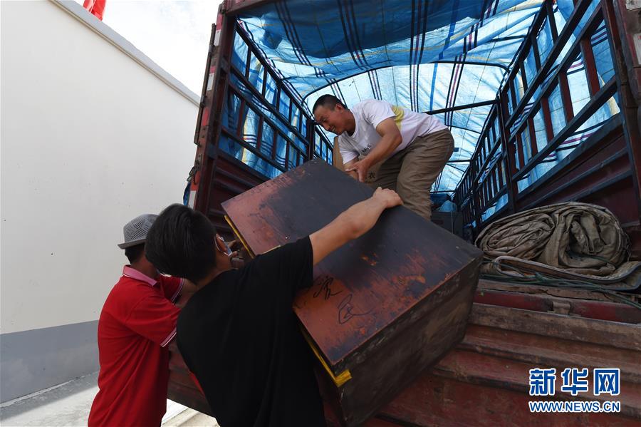 （新華全媒+）（26）千里“挪窩”，踏實(shí)開啟新生活