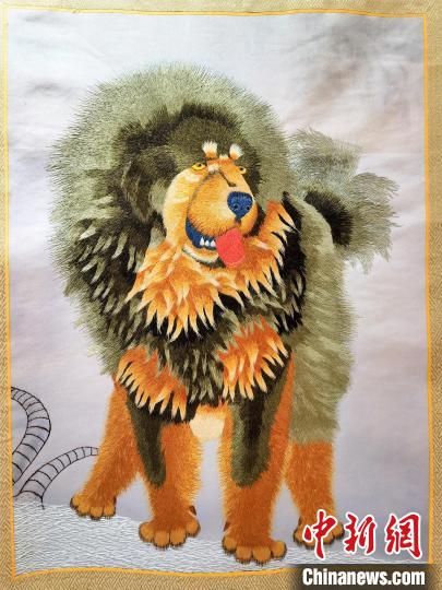 圖為藏繡作品?！∑钤鲚?攝