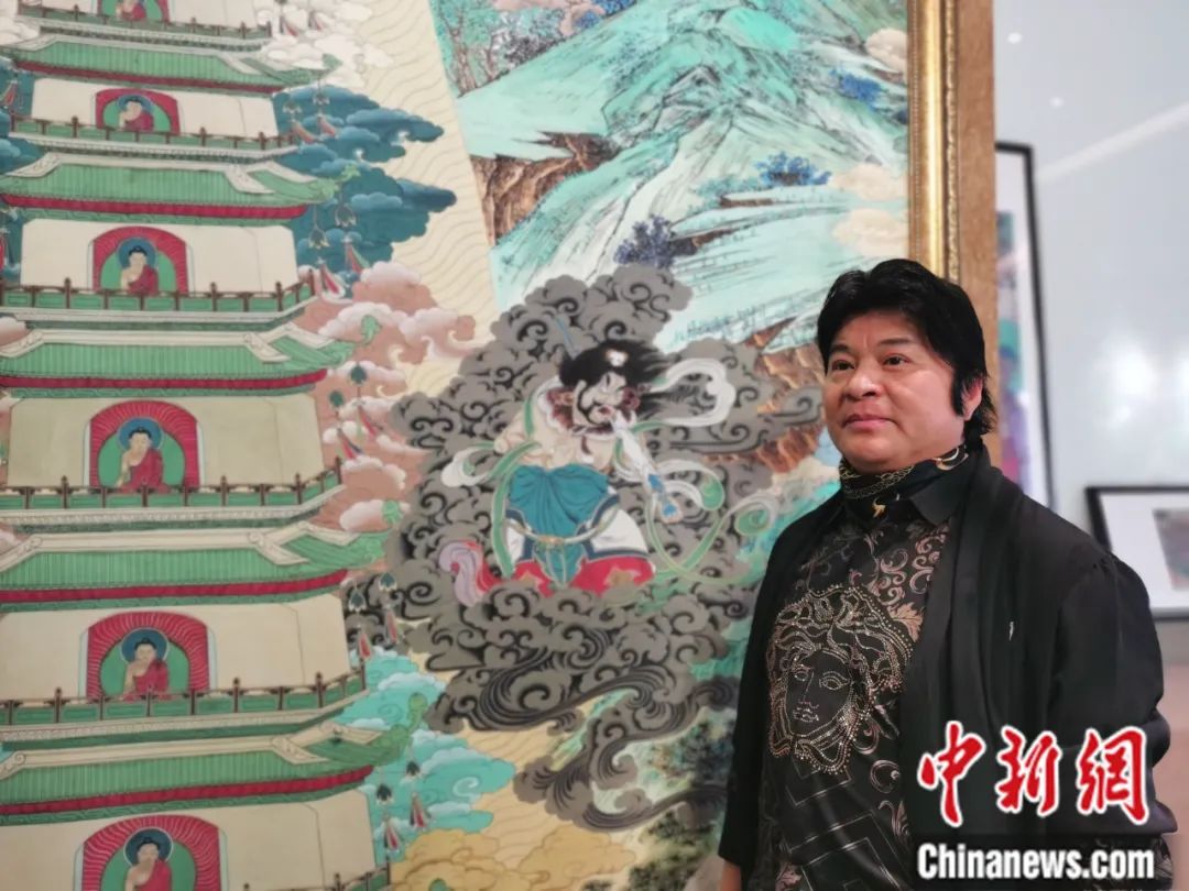 國家一級美術(shù)師劉觖。張?zhí)砀?攝